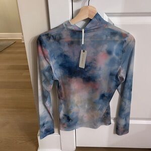 Anthropologie mesh long sleeve Patterned Long Sleeve Top